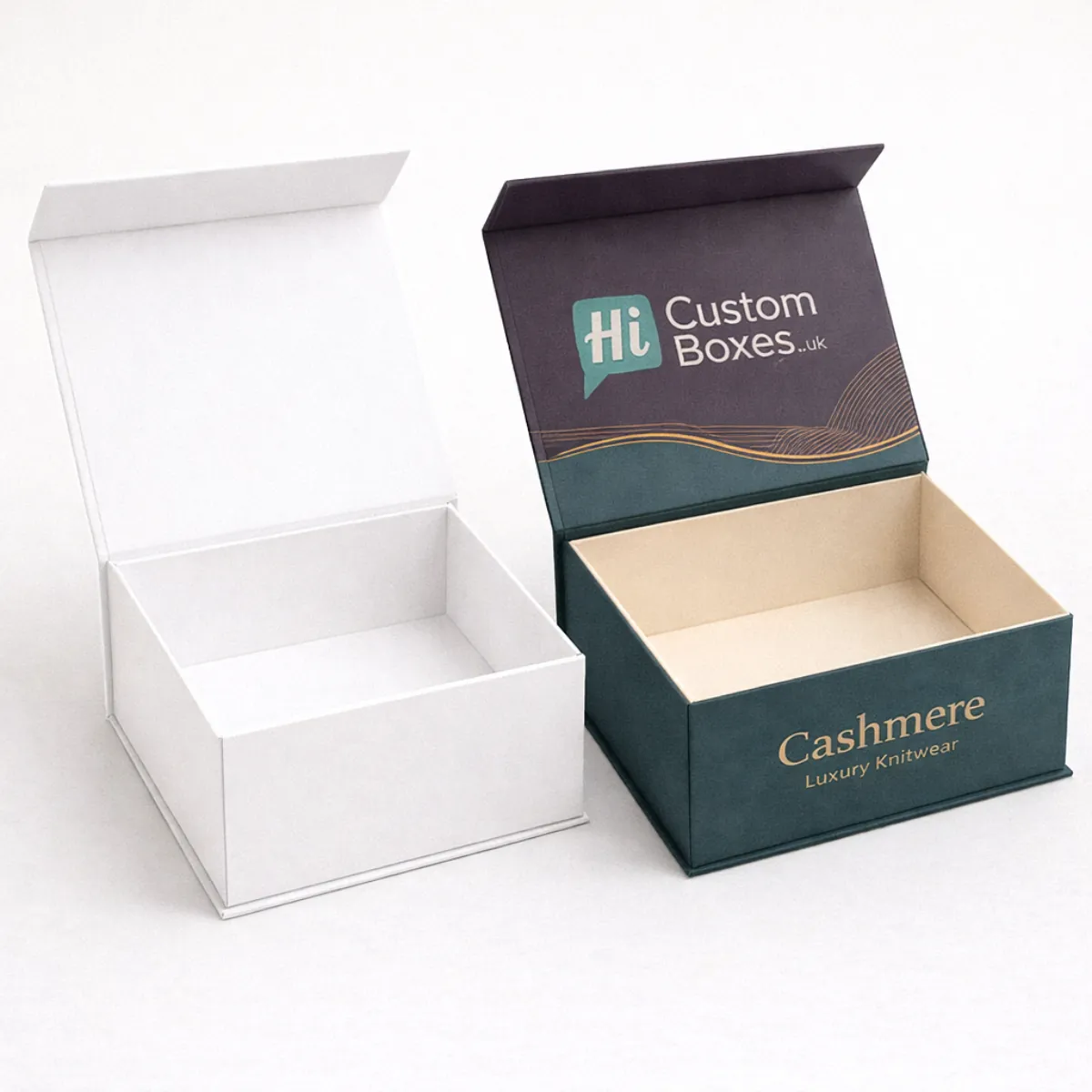 Two premium magnetic gift boxes with hinged lids- one minimalist white and one featuring deep teal tones- class=